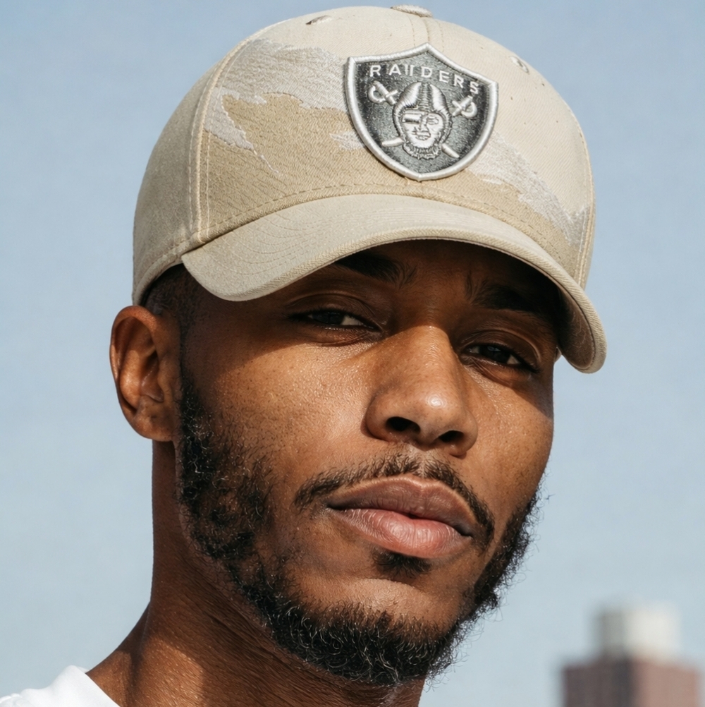 Raiders Splash Reebok Cap
